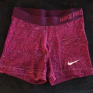 Nike pro shorts pink purple